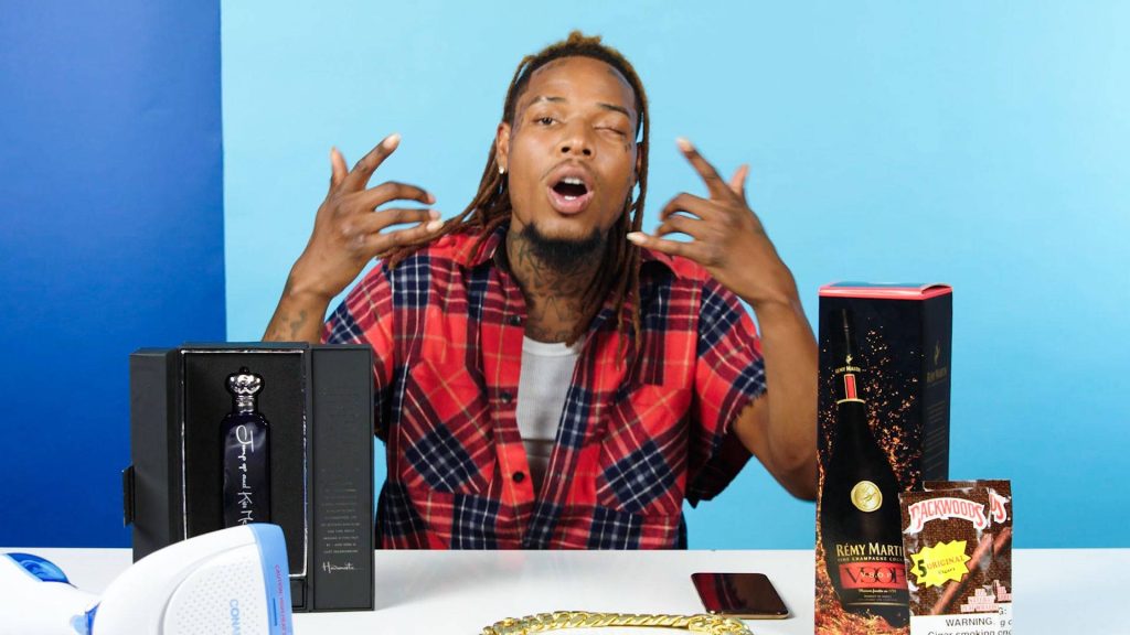 Fetty Wap wallpaper bright blue background with Rémy Martin cognac Backwoods cigars gold chain