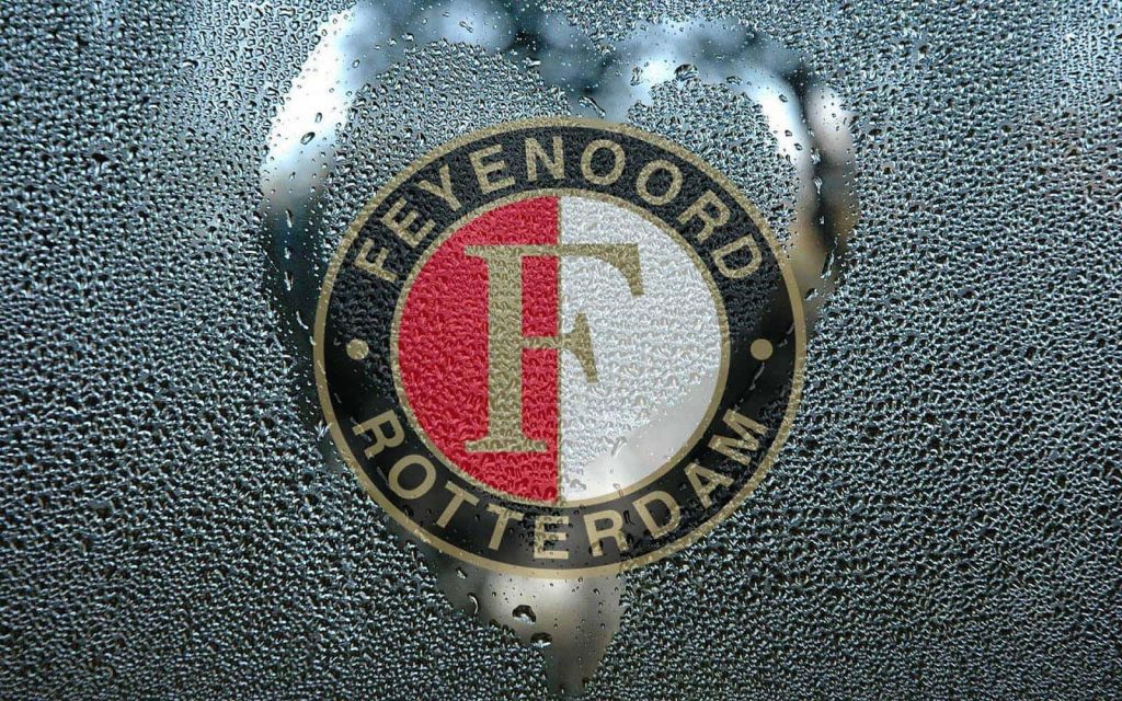 Feyenoord Rotterdam crest behind wet glass with heart-shaped water droplets wallpaper background