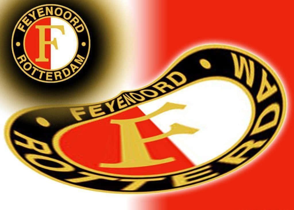 Feyenoord Rotterdam football club crest wallpaper with classic and modern logo on red background
