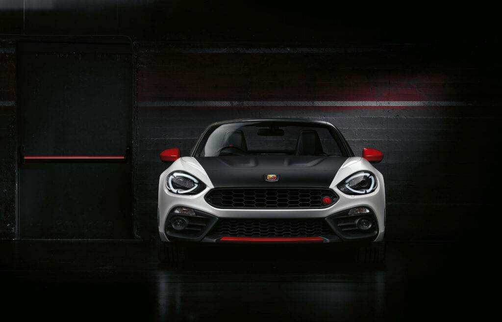 Fiat Abarth 124 Spider Wallpaper: Sporty Design in Dramatic Setting
