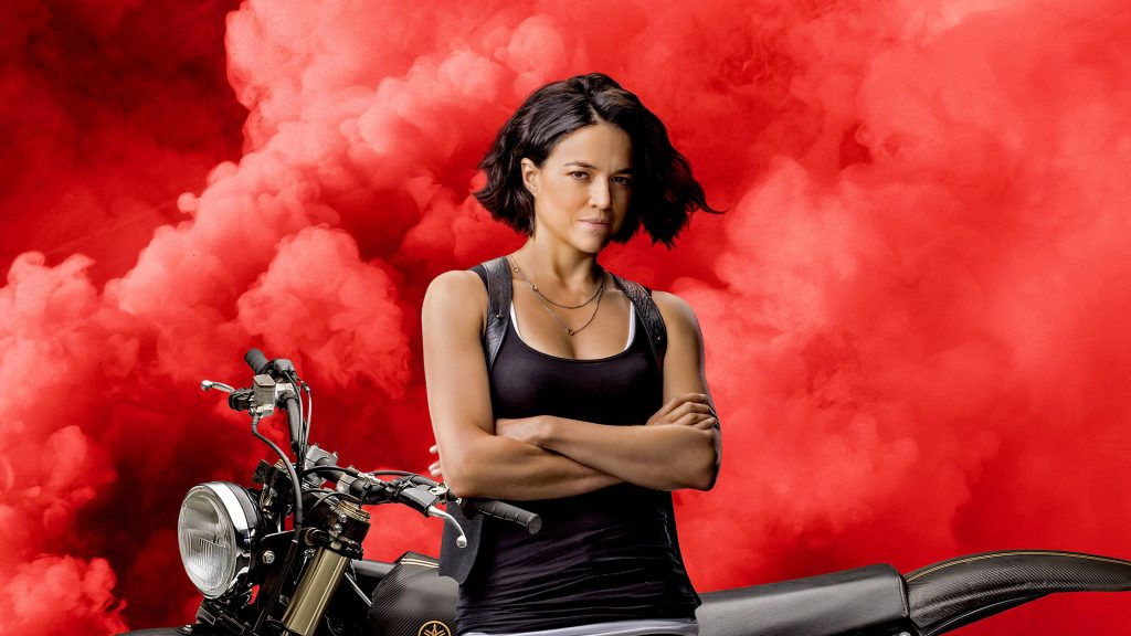 Michelle Rodriguez Fierce Fast and Furious 9 wallpaper black motorcycle red smoke background