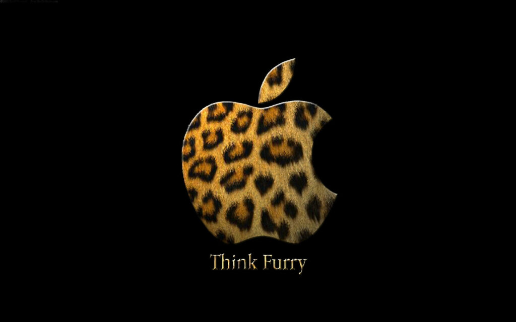 Fierce Leopard Print Background Accentuates Apple Logo with 'think Furry' Text Wallpaper