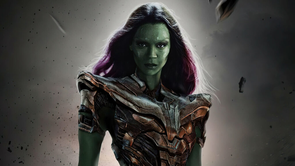 Marvelous Gamora: The Indomitable Warrior Adorned in Thanos' Battle Armor - Captivating 4k Marvel iPhone Background Shot Amidst Debris and Grey Atmosphere Wallpaper