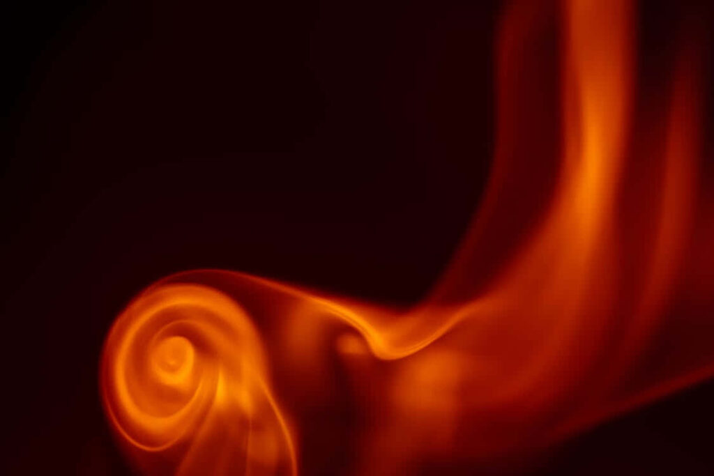 Fiery Swirls Abstract Wallpaper: Bold Red & Orange Dynamic Background