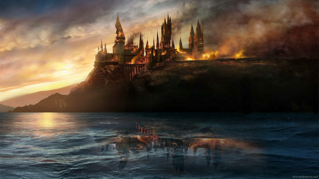 Fiery Hogwarts: Witness the Epic Battle for Hogwarts in this Cool Harry Potter Background Photo Wallpaper