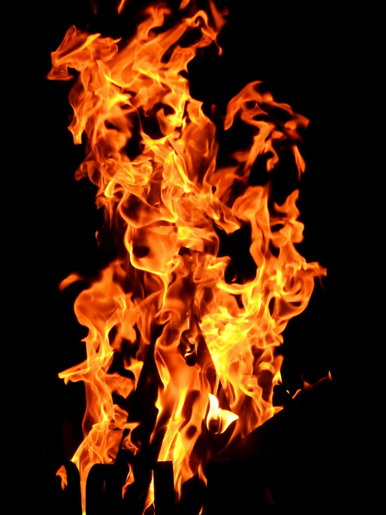 Burning Brilliance: Fiery Close-up Captured for 4K iPhone 6 Plus Background Wallpaper