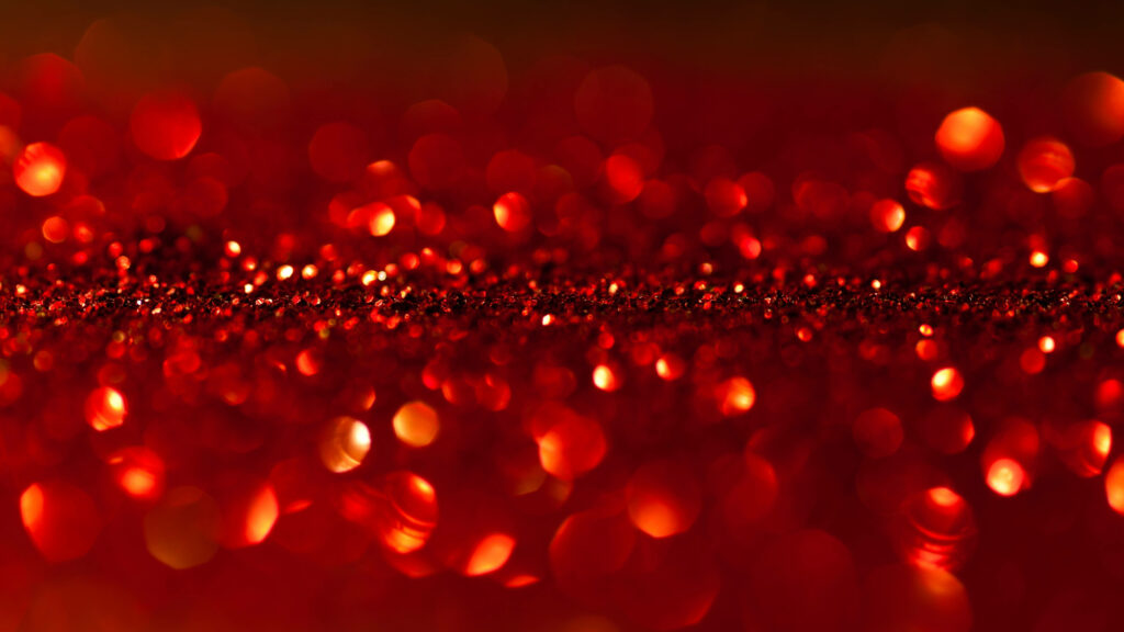 Captivating Red Glitter: An Immersive 5k HD Close-up of Shimmering Sparkles Wallpaper