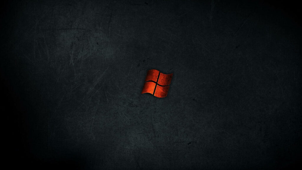 Fiery Elegance: The Captivating Red Windows Logo Embracing the Moody, Rugged Vibe of Black Windows 10 HD Desktop Wallpaper