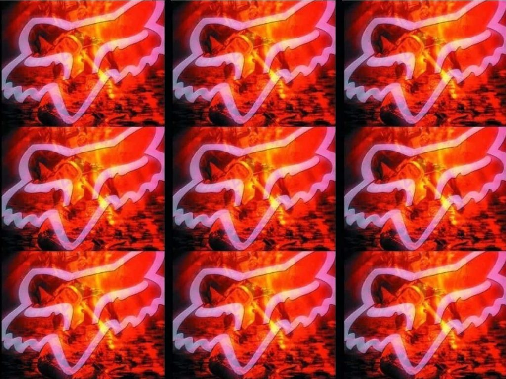 Bold Fox Racing wallpaper with fiery red orange 3x3 logo grid for motocross fans background