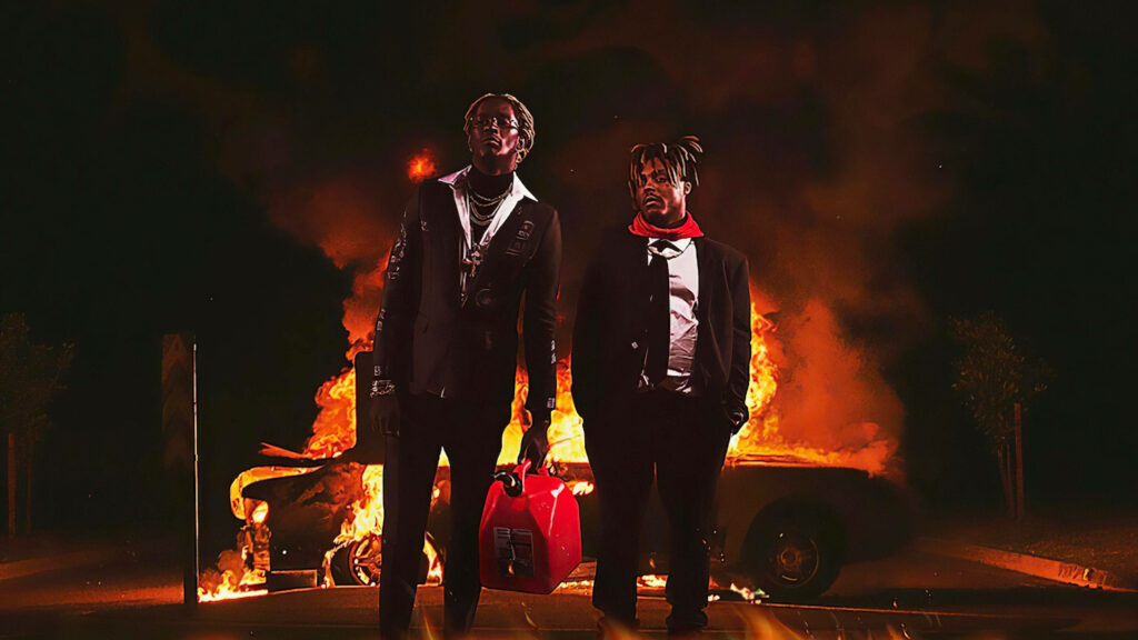 Celebrity Connection amidst Fiery Chaos: Juice Wrld and Friend Strike a Pose in Blazing Ambience - Captivating Desktop Background Wallpaper