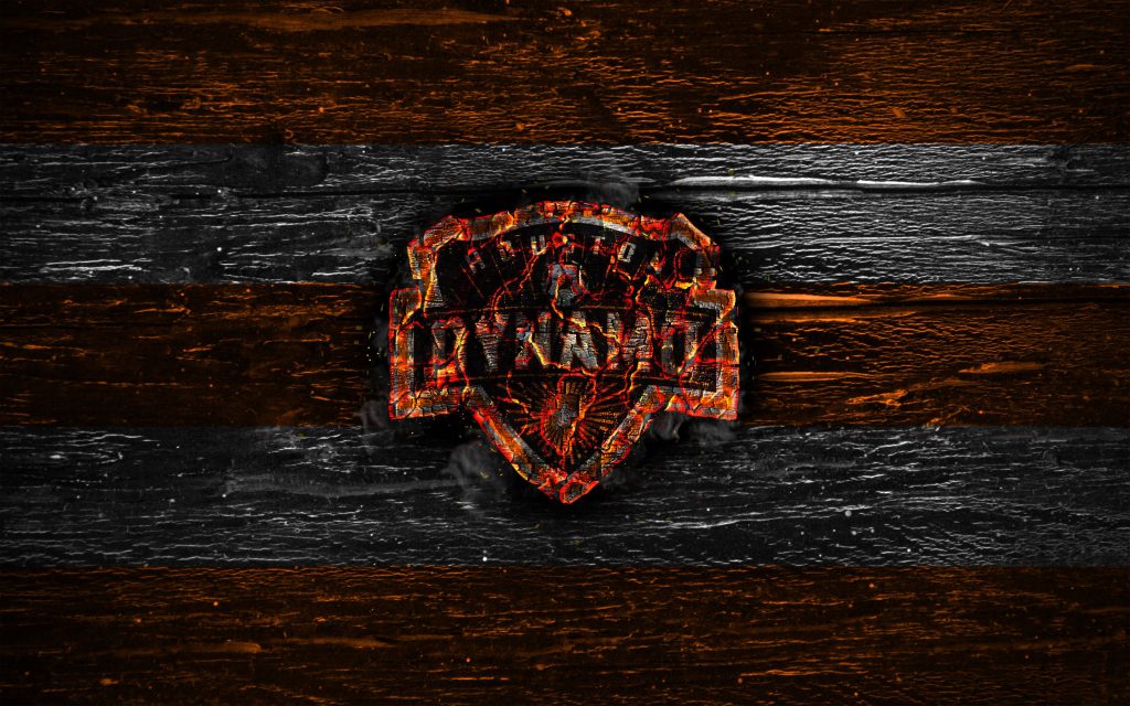 Houston Dynamo FC crest in fiery lava flames on black and orange striped textured background Wallpaper