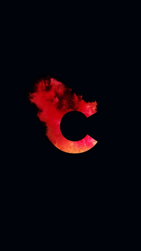 Fiery red and orange letter C blends into smoky texture on dark background modern wallpaper