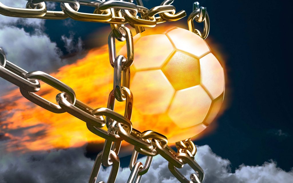 Fiery burning soccer ball chained in stormy sky intense CGI football wallpaper background