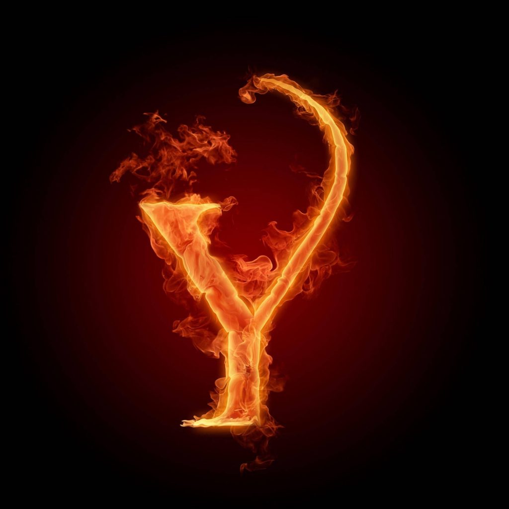 Fiery letter Y wallpaper with vivid orange flames on dark background digital art display energy