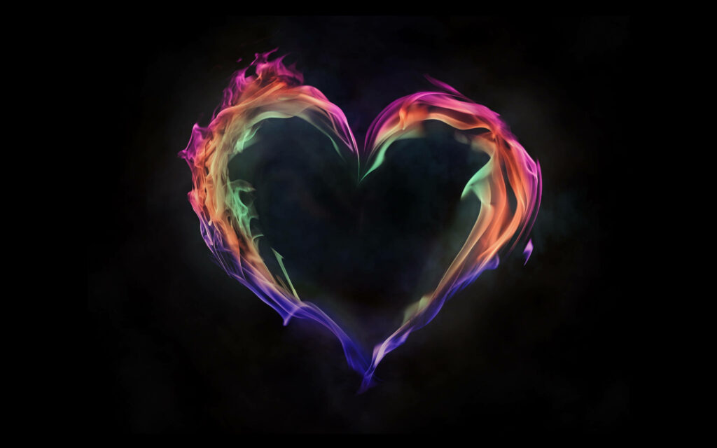 Neon heart made of swirling multicolored smoke glowing blue purple orange on black background Wallpaper