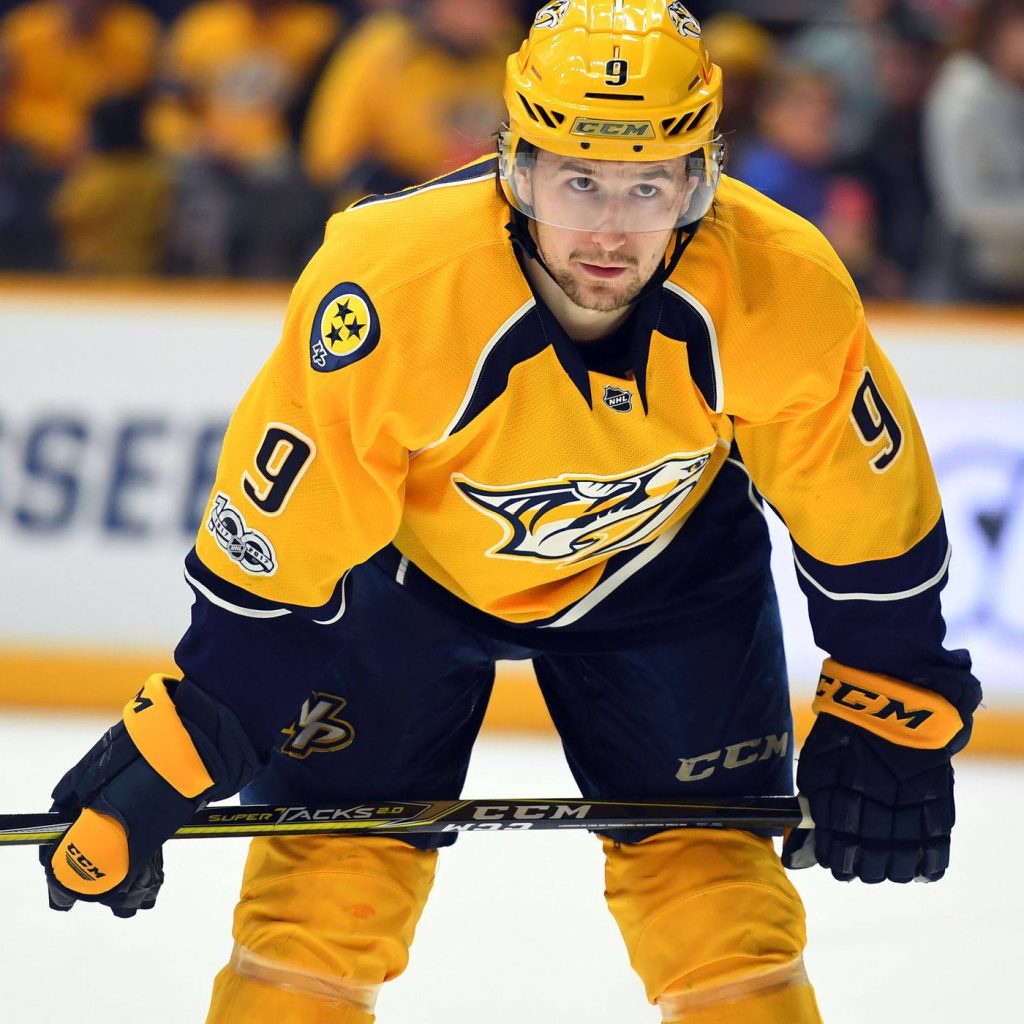 Filip Forsberg Nashville Predators wallpaper gold jersey ice hockey NHL star in action pose