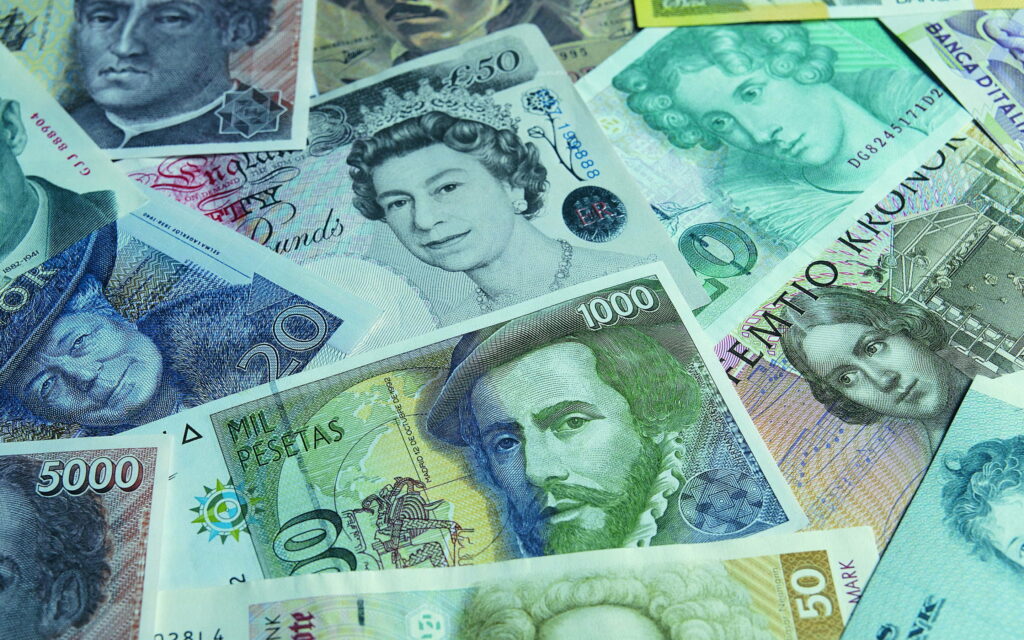 Stacks of Wealth: Sterling Banknotes Create a Captivating Money-Filled QHD Wallpaper