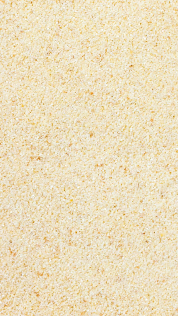 Close-Up of Fine Golden Sand Texture - Nature Wallpaper Background