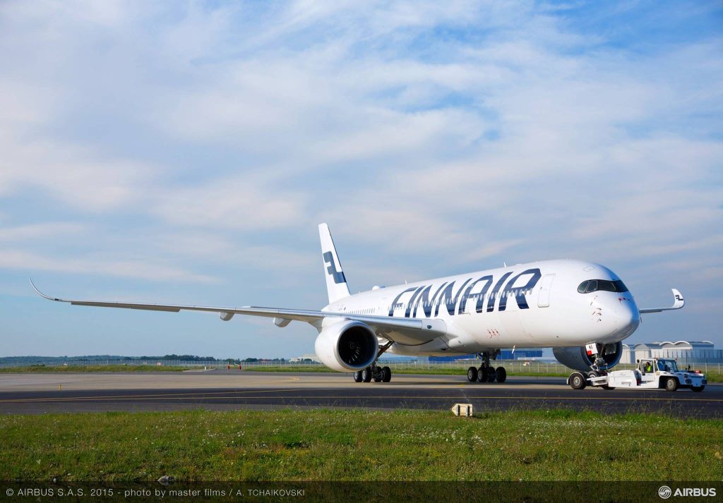 Finnair Airbus A350 XWB on tarmac sharp aviation wallpaper high resolution daylight sky background