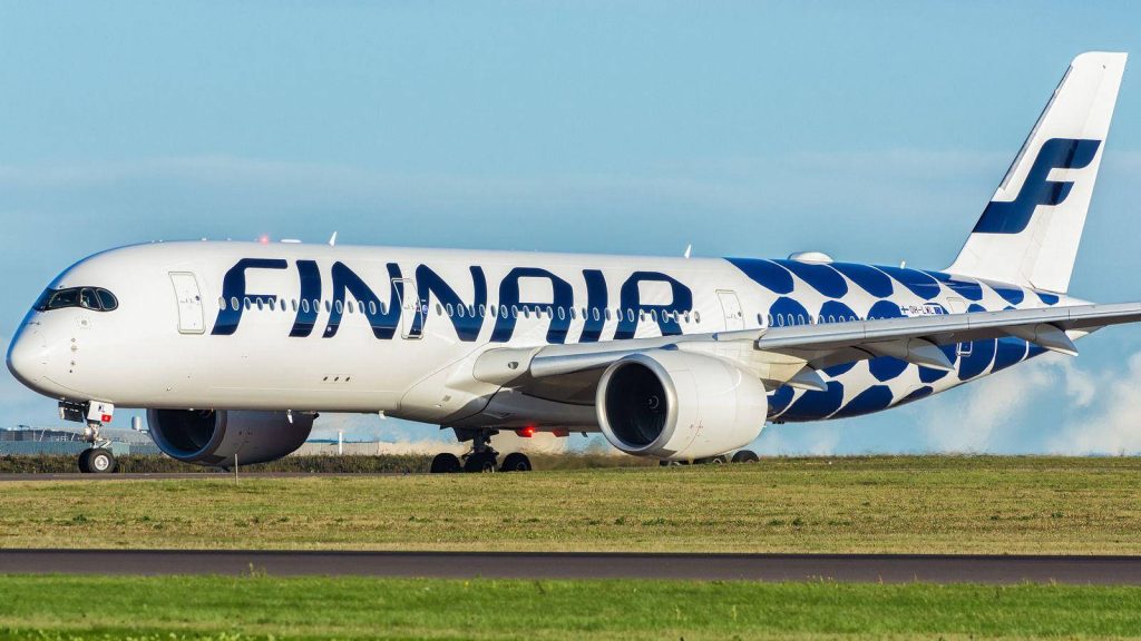 Finnair Airbus A350-900 Marimekko Kivet design blue circles on fuselage tarmac wallpaper background