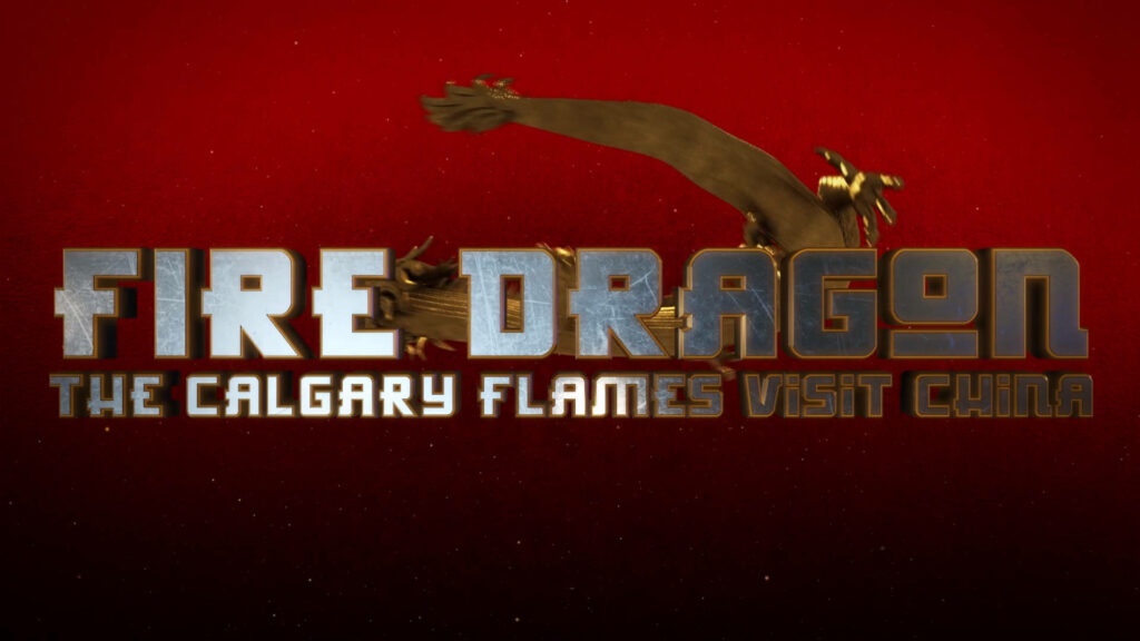 Fierce dragon soaring on red background with Fire Dragon Calgary Flames China visit metallic text wallpaper