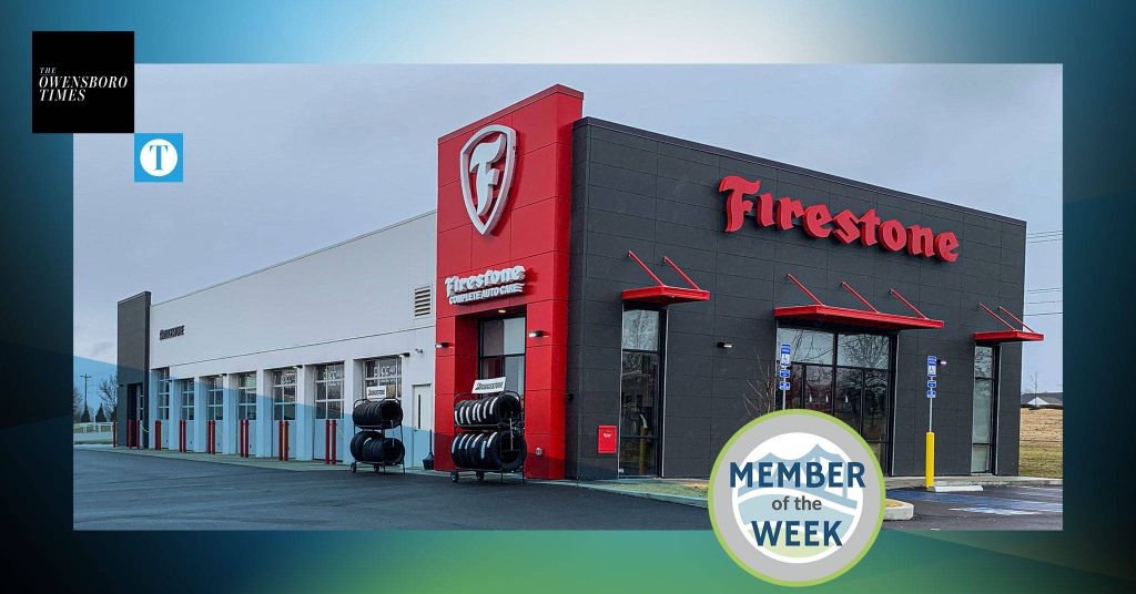 Firestone Auto Care exterior red black branding tire stacks modern shop wallpaper background