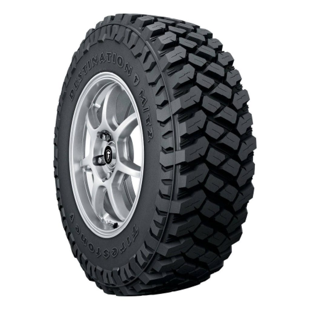 Firestone Destination M/T2 mud-terrain tire on silver alloy wheel studio photo white background Wallpaper