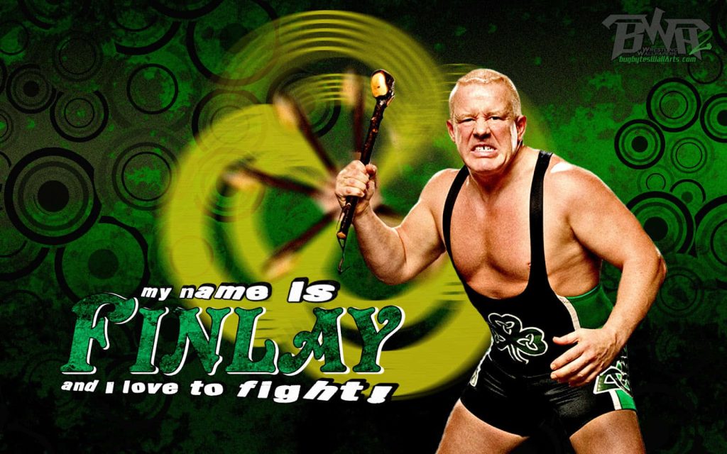 WWE wallpaper of Fit Finlay with shillelagh on vibrant green geometric background and bold text