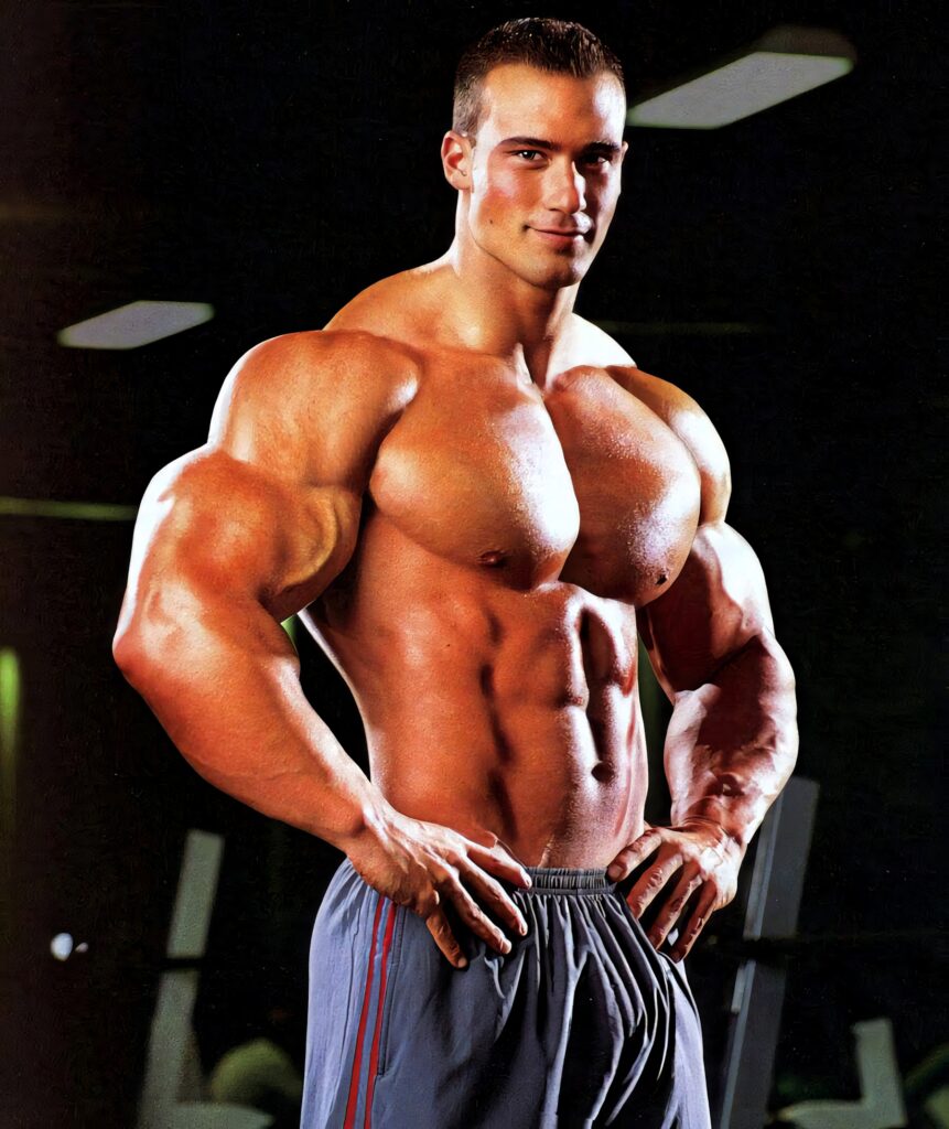 FitFreak Troy muscular physique confident gym stance high definition wallpaper background