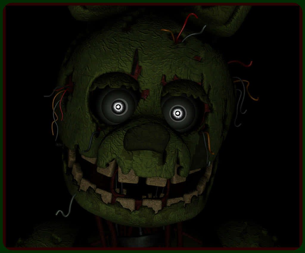Five Nights at Freddy's Springtrap animatronic close-up with glowing eyes dark horror wallpaper