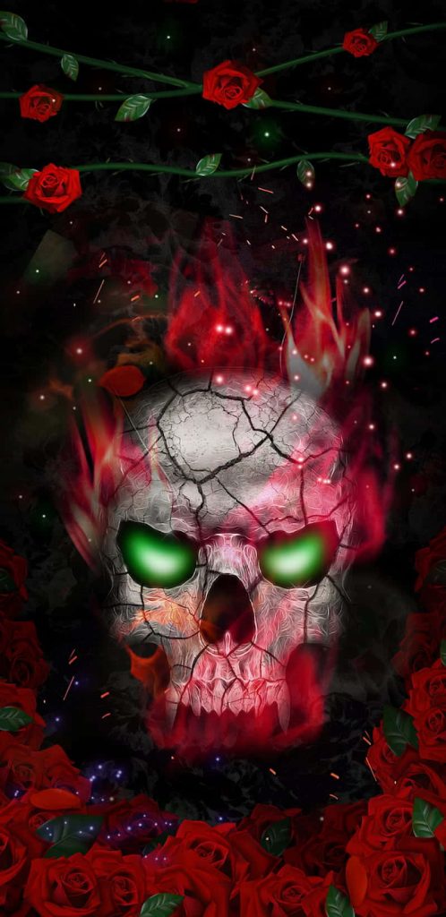 Flaming skull with green eyes surrounded by red roses and vivid fiery flames wallpaper
