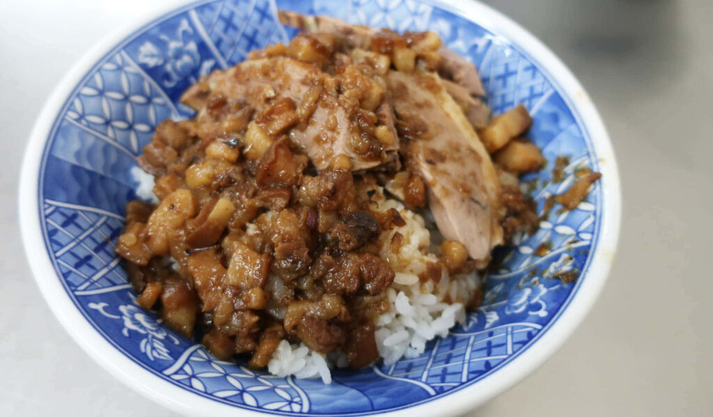 Flavorful Duck Rice Bowl - Traditional Dish from Duck Zhen, Kaohsiung Wallpaper