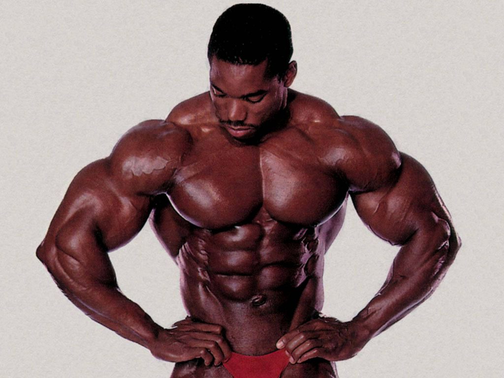 Flex Wheeler bodybuilding front lat spread pose showing muscular definition and symmetry wallpaper