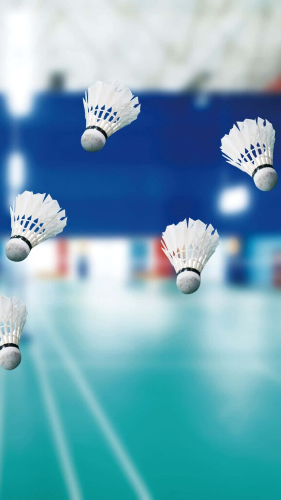 Badminton Bliss: Floating Shuttlecocks Dance on a Dreamy Blue Court Wallpaper
