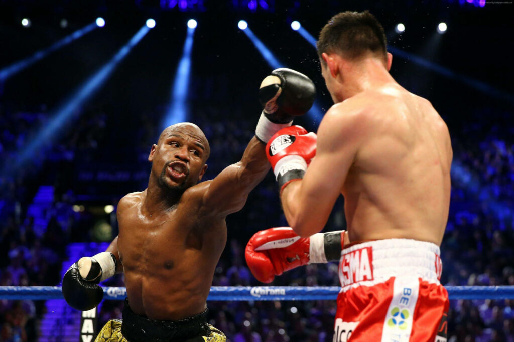 Floyd Mayweather Intense Boxing Match Wallpaper Background
