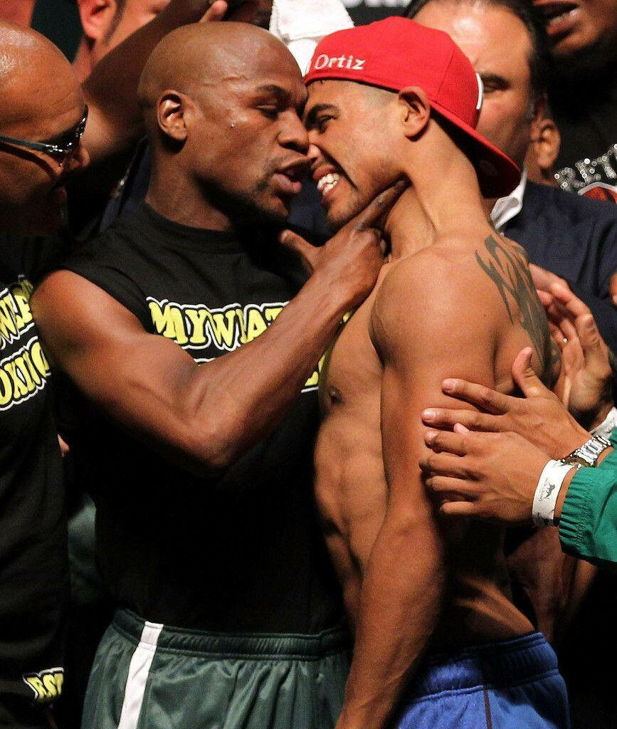 Floyd Mayweather Faces Off: Intense Wallpaper Background