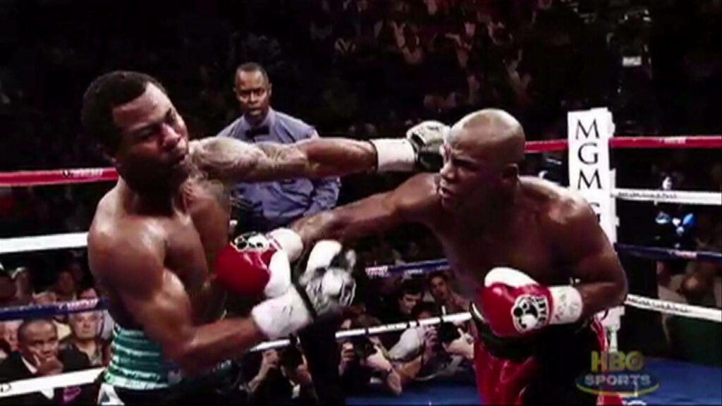 Floyd Mayweather: Powerful Punch Wallpaper - Boxing Match Action
