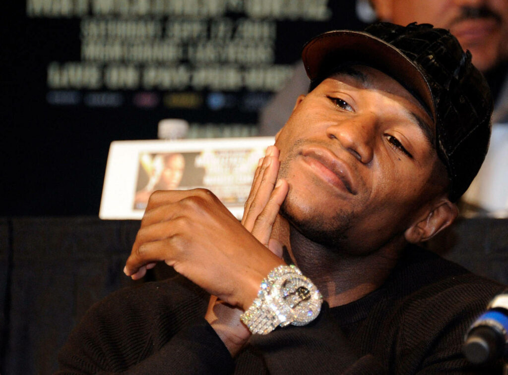 Floyd Mayweather's Luxurious Jewel-Encrusted Watch Wallpaper Background