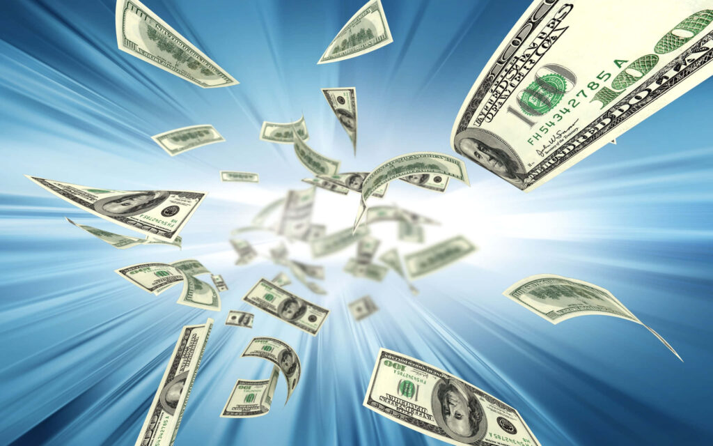 Hundreds of US dollar bills flying on radiant blue background creating prosperous energy wallpaper