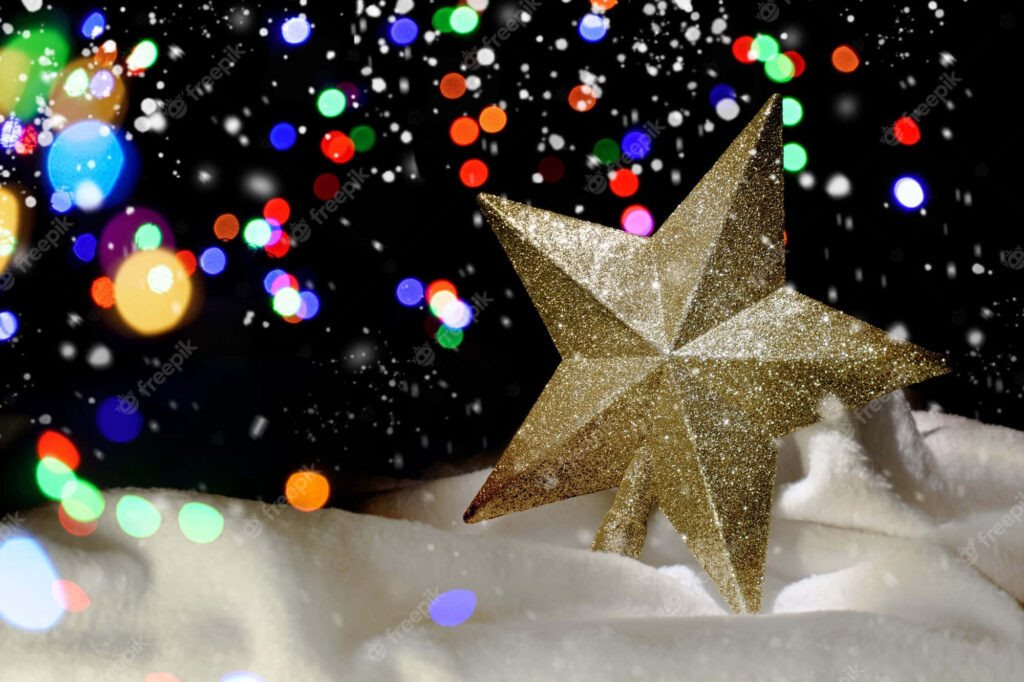 Glowing Holiday Guide: Capture the Magic with this Festive Christmas Star Background Wallpaper