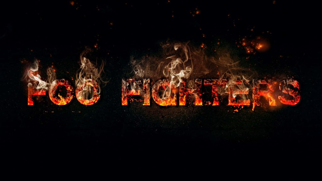 Foo Fighters band name in fiery digital art with glowing flames smoke on black rock wallpaper