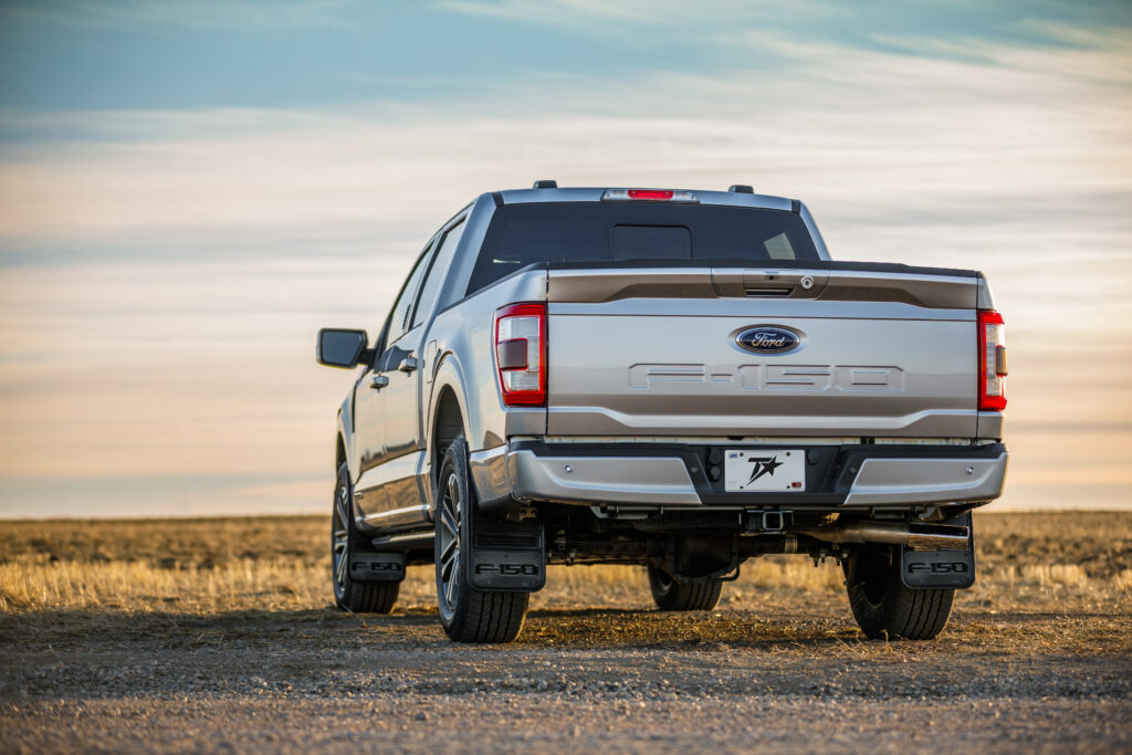 Ford F-150 Truck Back View in Serene Landscape Wallpaper