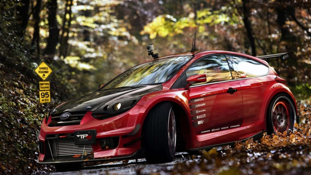 Ford Fiesta racing on scenic forest road showcasing sporty design and dynamic performance Wallpaper