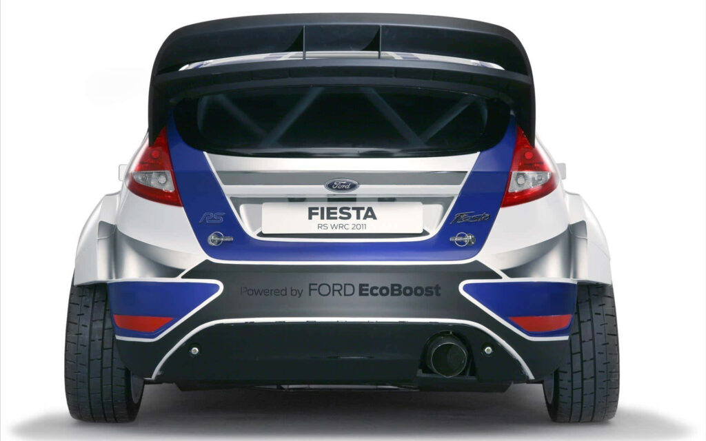 Rear view of Ford Fiesta rally car showing sporty design and high-performance action wallpaper