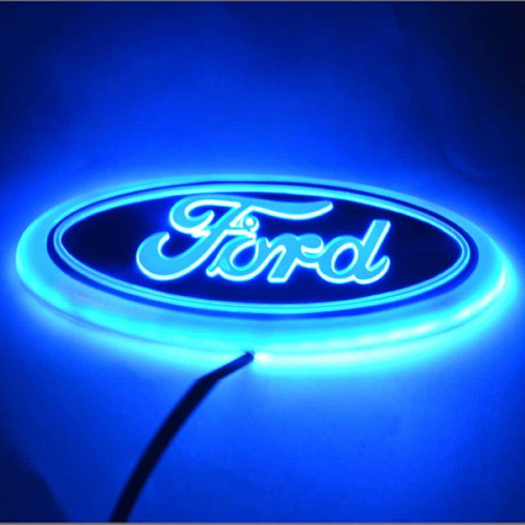 Ford logo wallpaper glowing electric blue neon on sleek deep blue background high resolution