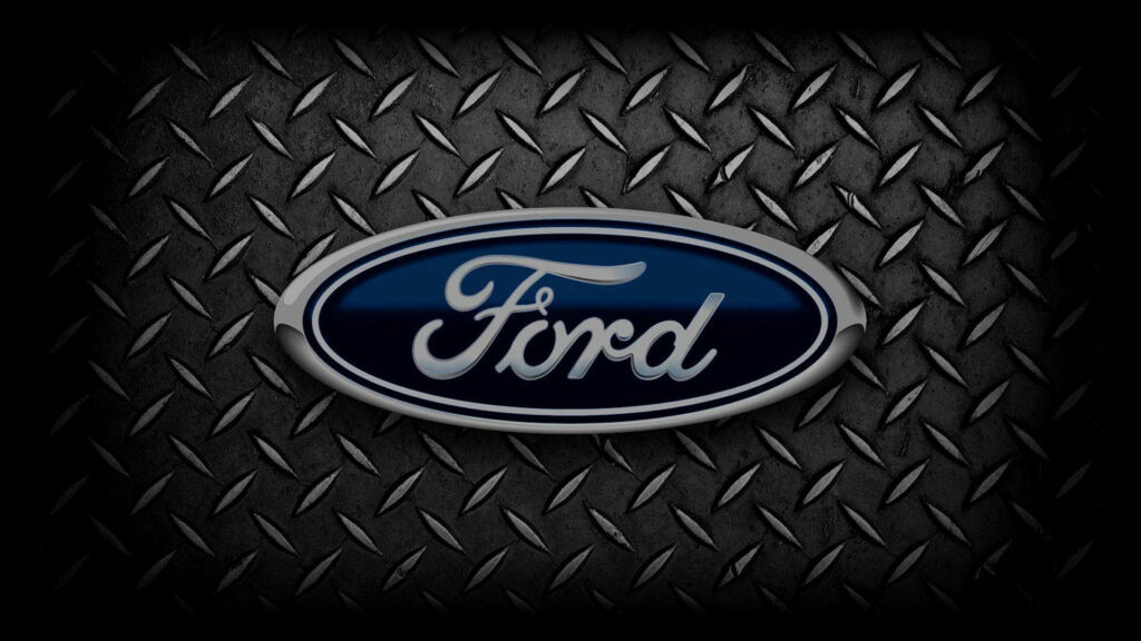 Ford Logo Wallpaper: Bold Design on Textured Dark Metal Plate