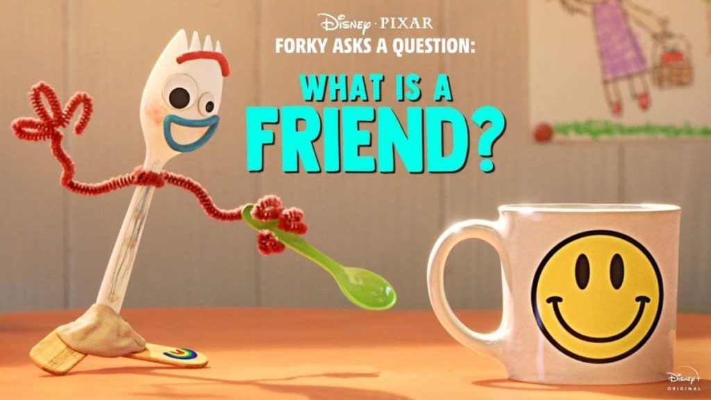 Forky from Disney Pixar Forky Asks a Question next to yellow smiley face mug CGI wallpaper background