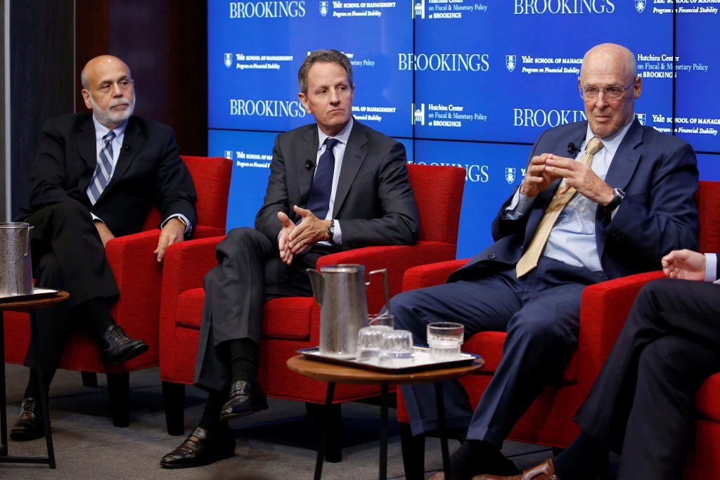 Former US Treasury Secretaries Paulson Geithner Bernanke at Brookings panel on fiscal policy discussion Wallpaper