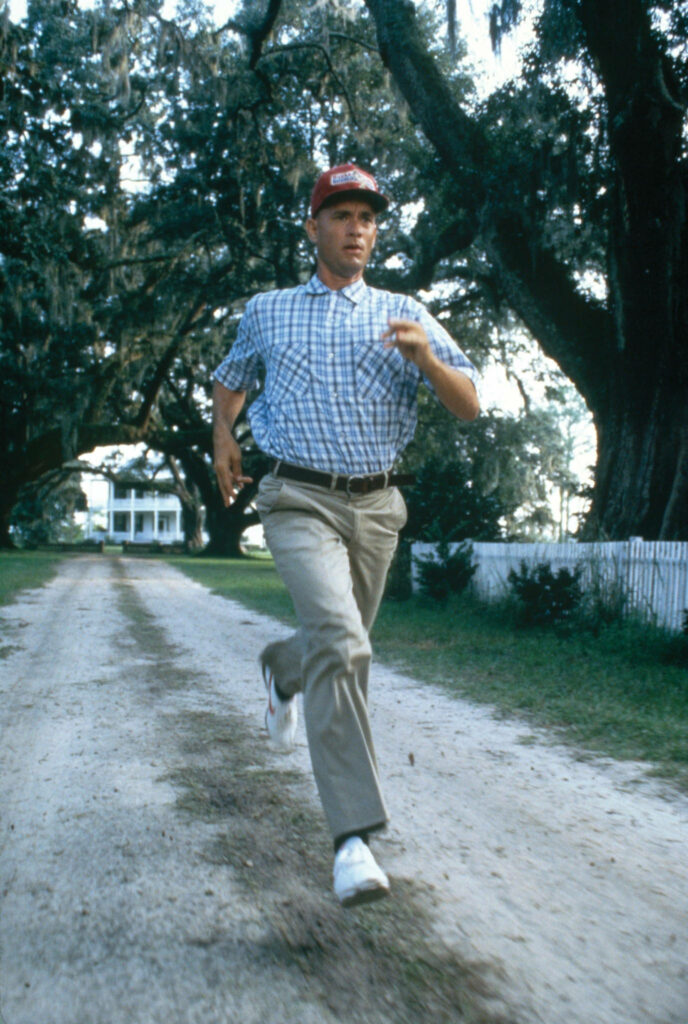 Serene Forrest Gump Running Wallpaper: Nature's Dynamic Background