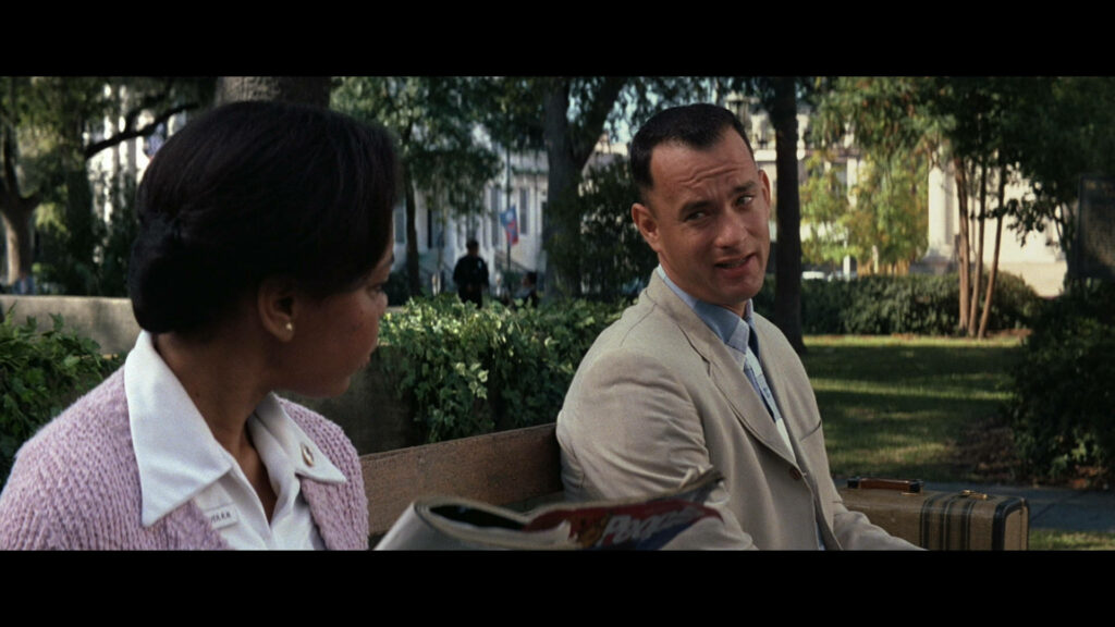 Forrest Gump Bench Scene Wallpaper in a Lush Park Setting